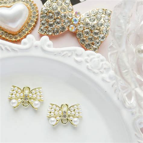 つぶつぶパールリボン・ゴールドメタルコネクターチャーム/2個 | COCONEL