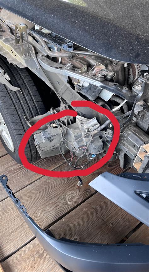 Need help on Part identification for a 2014 Nissan Altima s. It’s a weird black box on Right ...