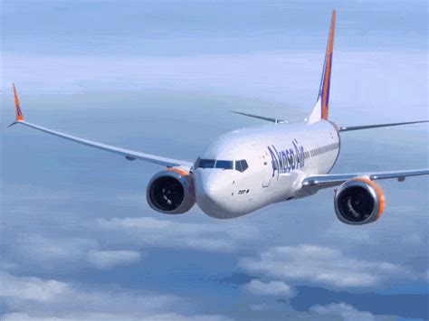 Passenger tries to open emergency door in Varanasi Plane halted before ...