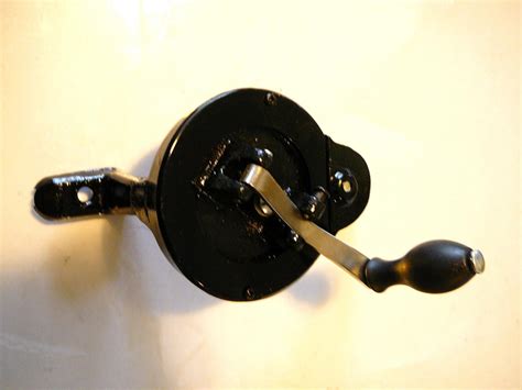 Image result for Hand-Cranked Sewing Machine