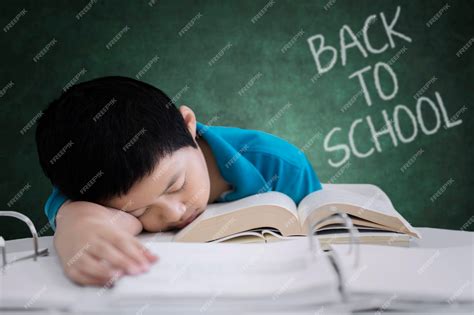Premium Photo | Preteen student sleeping in the classroom