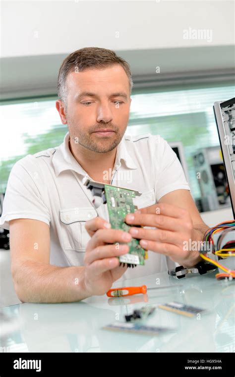 Image result for Man Repairing Computer