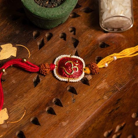 Buy Auspicious Om With Rudraksh Rakhi Online in India - Mypoojabox.in