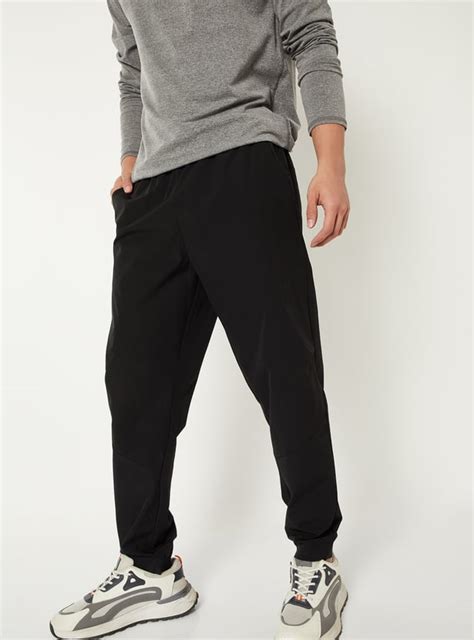 Buy Men Solid Athleisure Joggers Online at just Rs. 999.0 ...