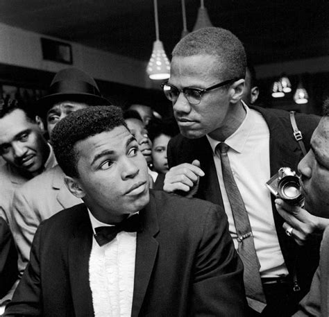 Muhammad Ali and his parents Odessa Clay and Muhammad Ali (then known ...
