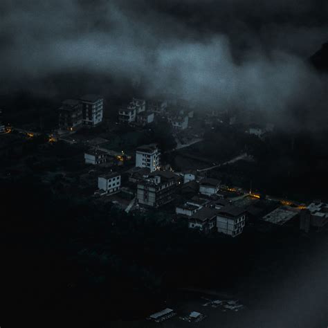 Download wallpaper 3415x3415 city, aerial view, buildings, clouds, dark ...