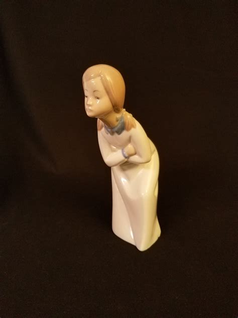 Rex Valencia Spanish Porcelain Figurine Girl in Pigtails and Bedclothes Bending Over to Look at ...