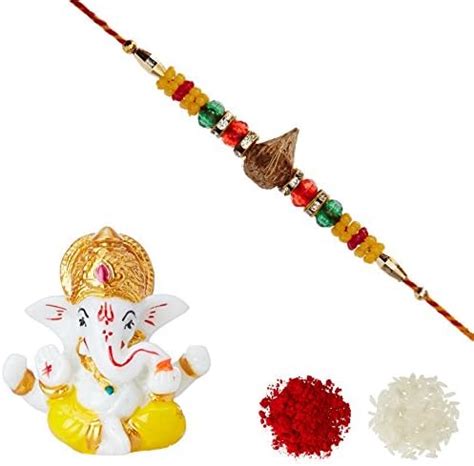Buy Aheli Wooden Coconut AD Ring Crystal Rakhi for Men with Ganesha ...