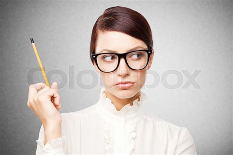 Strict woman in large glasses | Stock image | Colourbox