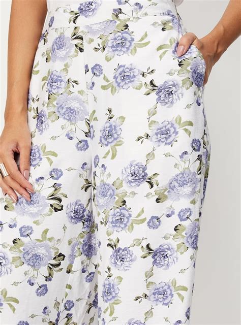 Buy Women Floral Printed Wide Leg Trousers Online at just Rs. 999.0 ...