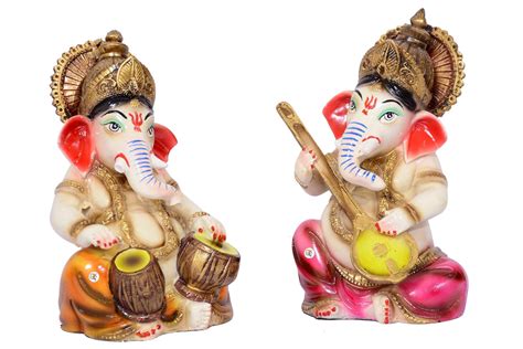 Buy Polyresin Sitting Lord Ganesha Singing and Playing Different ...