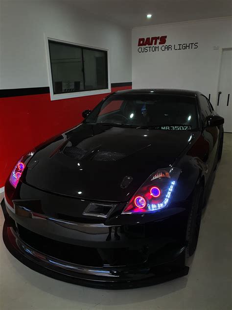 Nissan 350Z Headlights with Multicoloured Halo Rings, Demon Eyes and "Honeycomb" Projector Lens ...