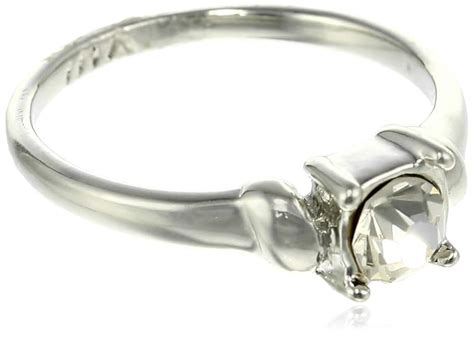 Estele white stone with gold band classing ring for women : Amazon.in ...