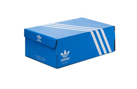 Adidas Niteball original blue box shoes, sneakers and trainers. Isolated on a transparent ...