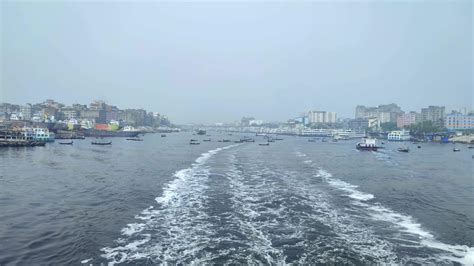 Wake of vessel. Wide wake trail from boat. Ships are standing both side ...