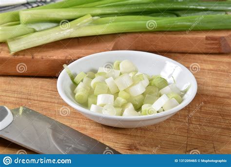 Chopped green onions stock image. Image of wooden, green - 131209465