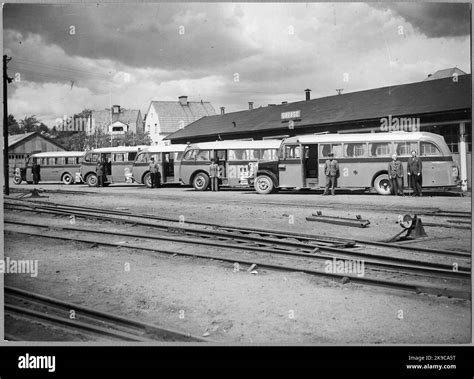 Buses with their drivers outside a garage in Norrköping Stock Photo - Alamy