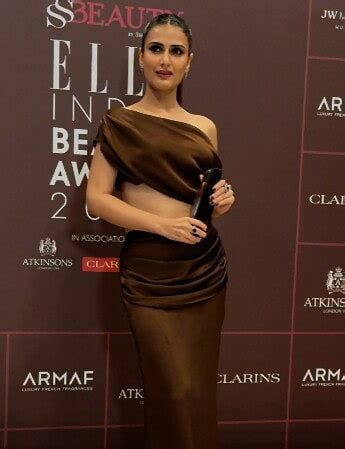 Chic and glamorous! #FatimaSanaShaikh stuns in a brown gown as she ...