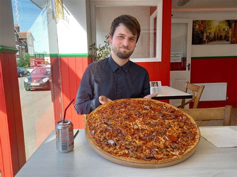 We try to eat 20-inch Big Boys Special pizza in Wincheap, Canterbury