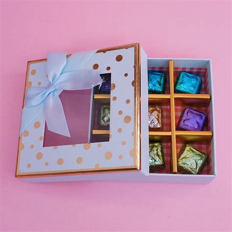 Send Pearl Rakhi with Assorted Chocolates in Box N Card Online ...