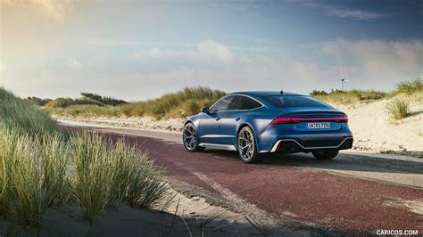 Audi RS 7 Sportback Performance | 2023MY (Color: Ascari Blue Matt) | Rear Three-Quarter
