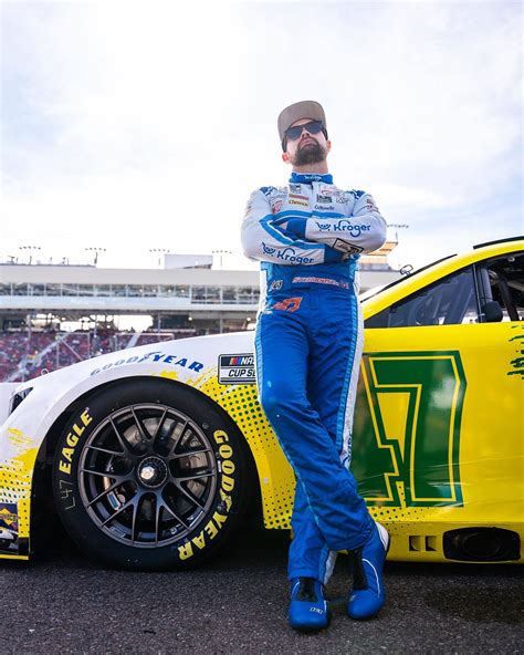 Download Ricky Stenhouse Jr. Leaning Against Car Wallpaper | Wallpapers.com