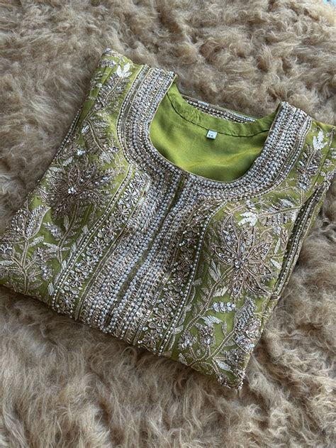 Zari & Pearl Hand Embroidered Festive Suit with Intricate Neckline Det ...