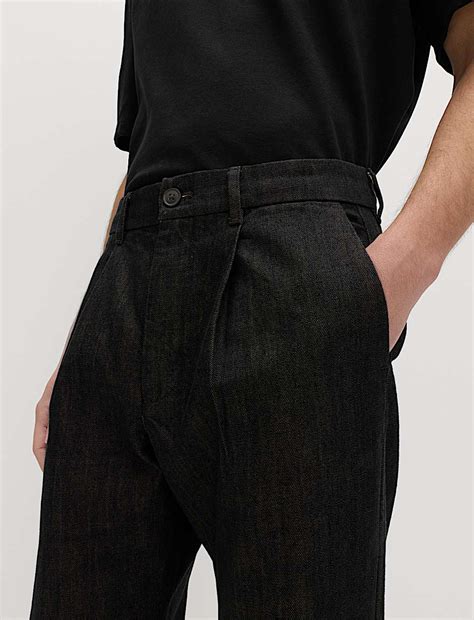 Buy Tapered Fit Smart Pleat Jeans at Marks & Spencer