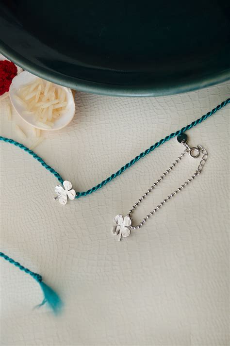Buy Good Luck Clover Sterling Silver Rakhi With Lumba Combo by Mannash ...
