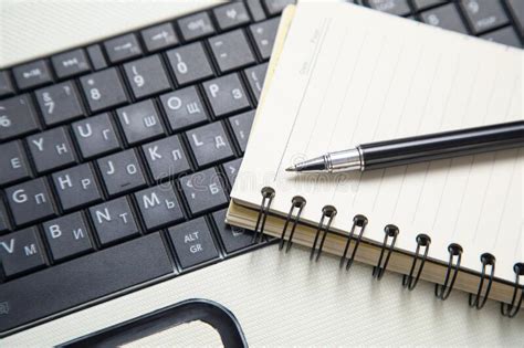 Pen and Notepad on the Computer Keyboard Stock Image - Image of button ...