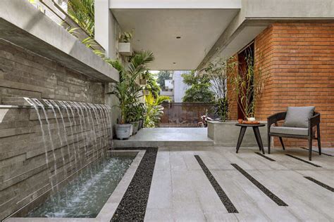 An open central courtyard binds all three floors of this family home ...