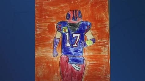 Boy with rare disorder uses mouth to draw picture of Bills quarterback ...
