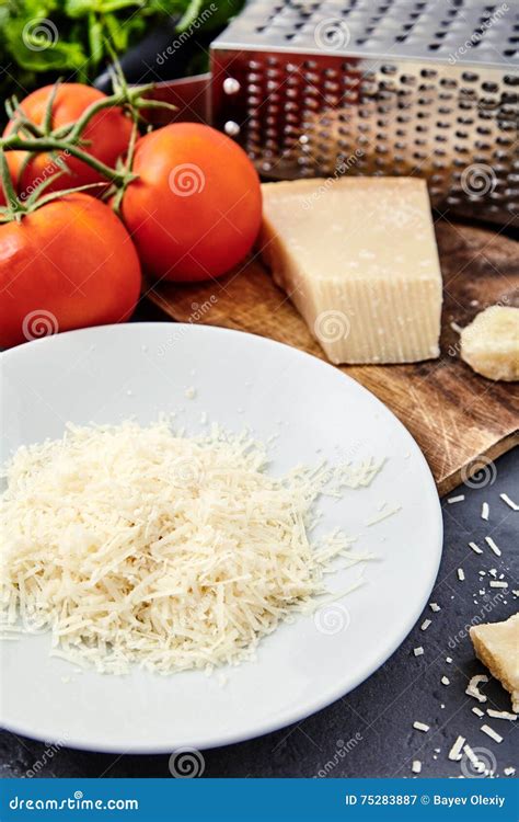 Piece of a Parmesan and Grated Cheese Stock Image - Image of grated ...
