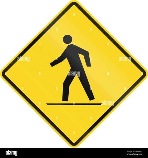 Canadian road warning sign - Pedestrian crossing. This sign is used in ...