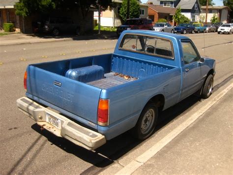 OLD PARKED CARS.: Little Blue Pickup #1: 1982 Chevrolet Luv Diesel.