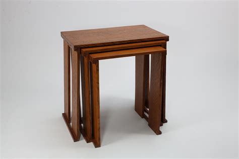A nest of three Art Deco wild grain oak side tables of planked construction. For Sale at 1stDibs
