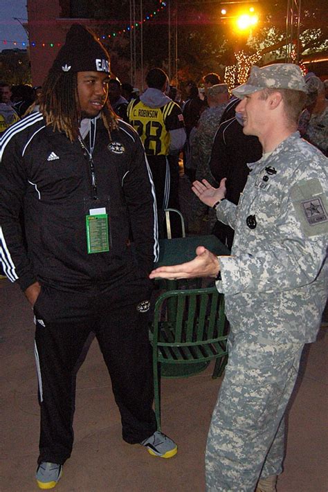 Soldiers mentor All-American players, band members during bowl week ...