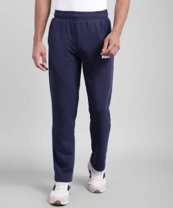 PUMA ESS Logo Pants TR op Solid Men Blue Track Pants - Buy PUMA ESS ...