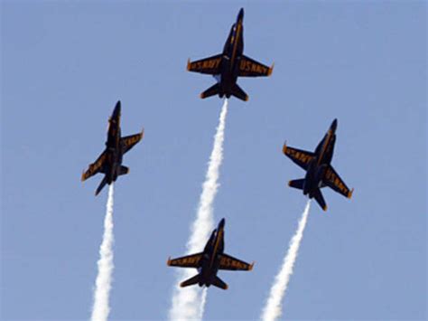 May 20, 2012 - Members of the US Navy Blue Angels separate while ...