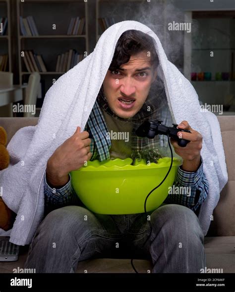 The sick man doing inhalation at night in home Stock Photo - Alamy