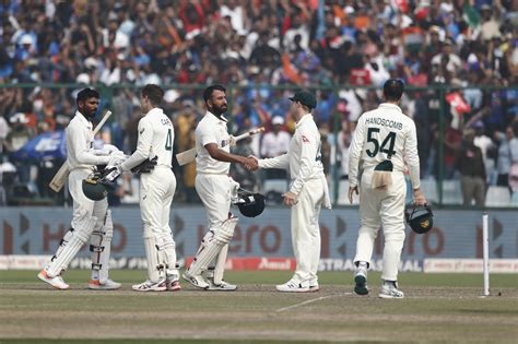 India and Australia players shake hands after the match | ESPNcricinfo.com