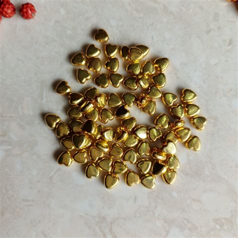 Golden Rakhi beads