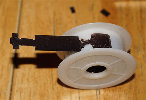 Image result for How to Rewind a Tape Measure Spring