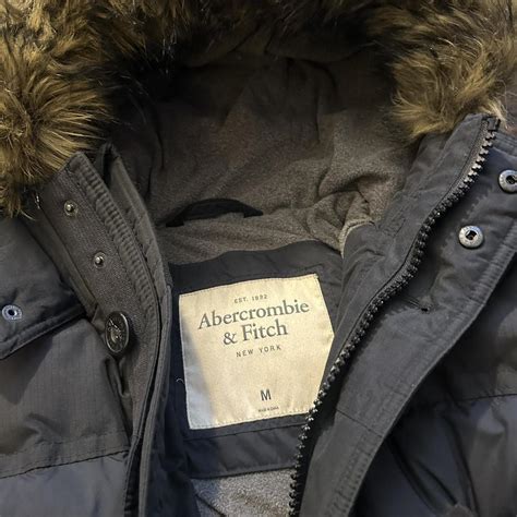 Abercrombie & Fitch navy puffer jacket with faux fur... - Depop