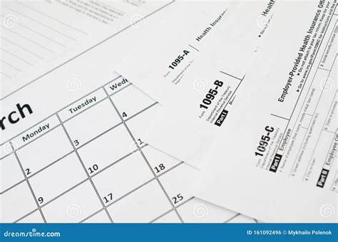 IRS Form 1095-a 1095-B and 1095-C Blank Lies on Empty Calendar Page Editorial Photo - Image of ...