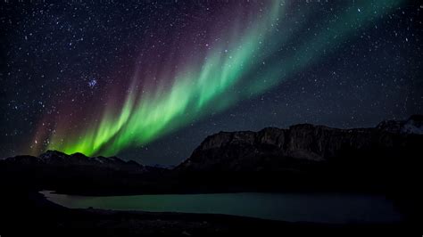 Download wallpaper 1366x768 northern lights, starry sky, mountains ...