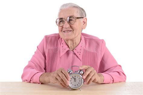 Woman sitting with clock stock image. Image of older - 46689459
