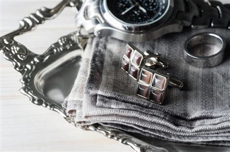 Premium Photo | Shiny cufflinks with gemstones