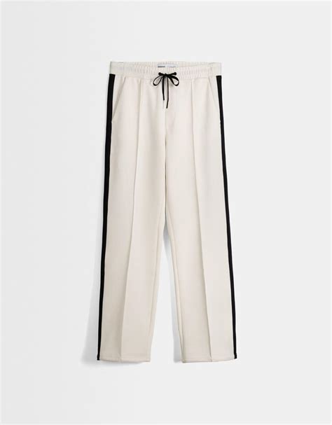 Interlock trousers with side stripes - Men | Bershka