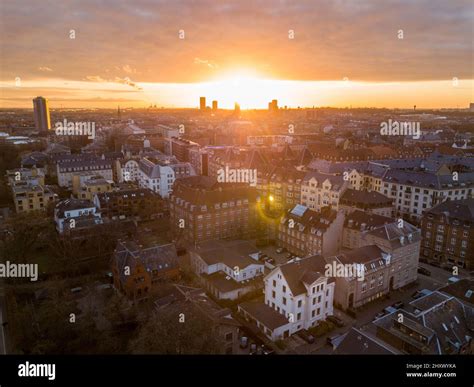 Aerial view of the cityscape of Copenhagen the capital city of Denmark at sunrise or sunset ...